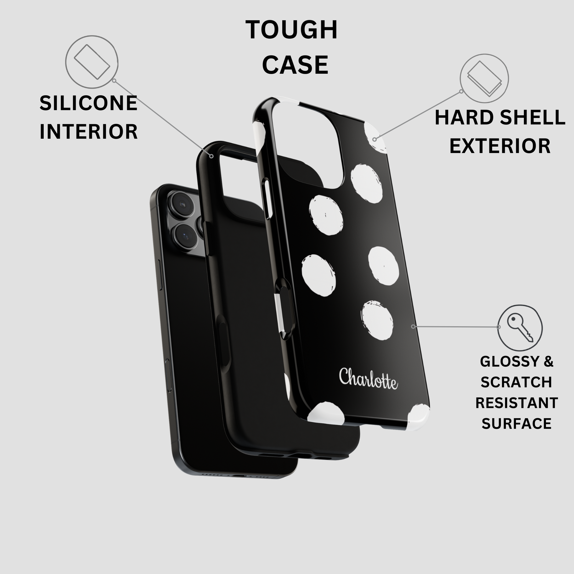 Black phone case with white polka dots and the name 'Charlotte' printed on the back, shown with callout labels for tough case features on a light gray background.