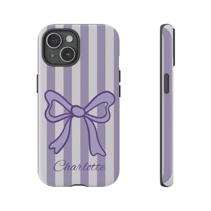 Phone case with purple bow and striped pattern on a white background