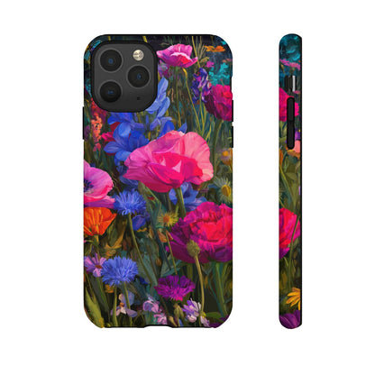 A durable phone case featuring a dense, colorful garden illustration. The artwork showcases large, blooming hot pink poppies and bright blue wildflowers against dark green stems and foliage in a modern, painterly style.
