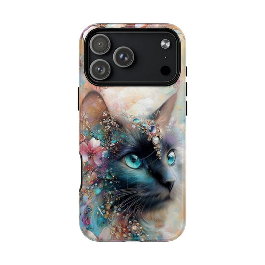 Close-up of a whimsical cat design with bright blue eyes and sparkling jewel accents on the fur.