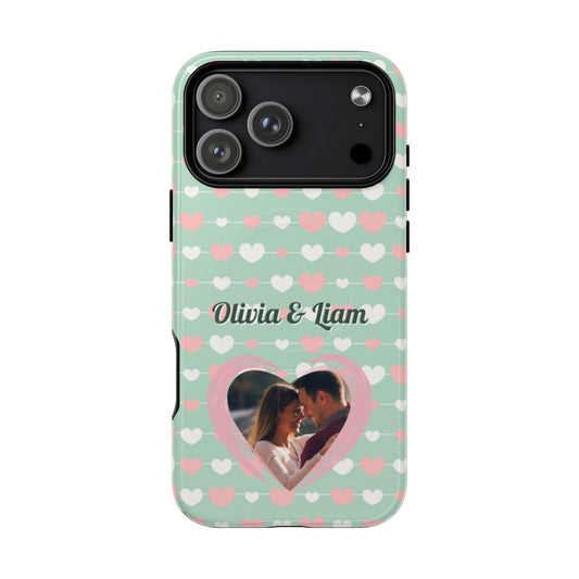 Personalized mint green phone case featuring a repeating pink heart pattern and a custom photo in a central heart frame.
