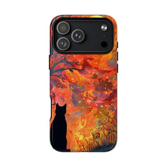 Silhouette of a black cat looking out at a vibrant forest of glowing orange and red autumn leaves.